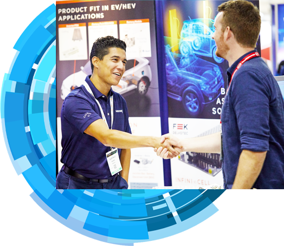 Attendee and exhibitor shaking hands at a tradeshow 